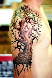 Tree of Life tattoo on arm and shoulder